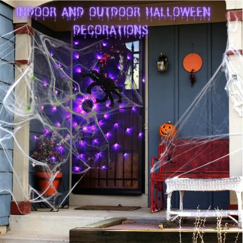 Front porch with Halloween decorations including spider webs, purple lights, a spider, and a pumpkin.